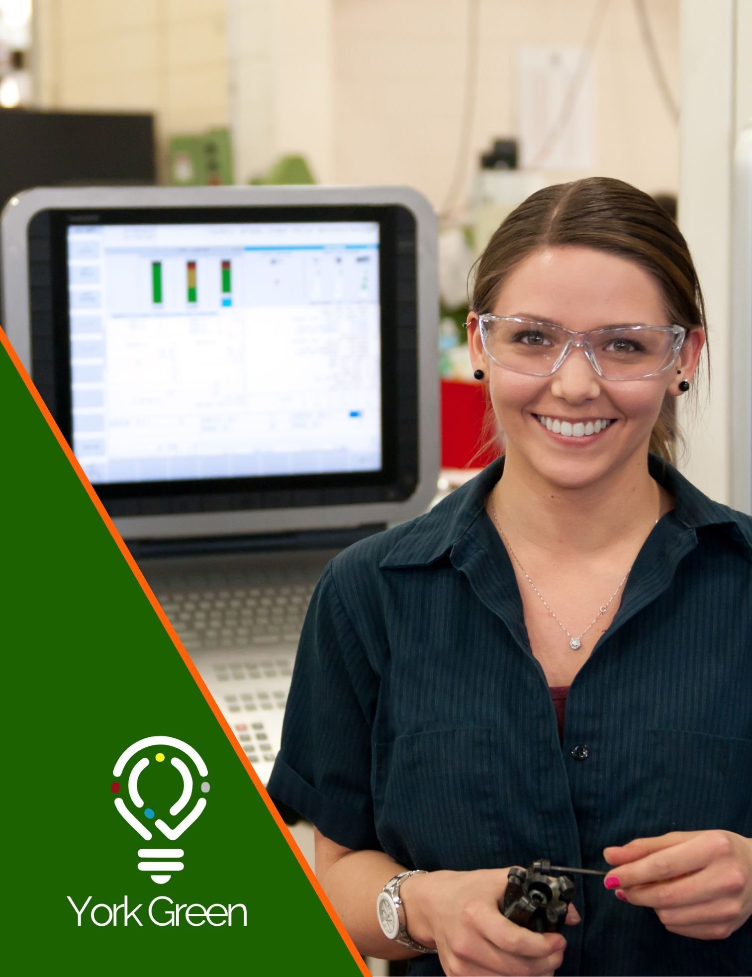 Machine operator at control console - PUWER